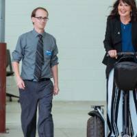 President Philomena Mantella riding on a Segway at the Engineering Design Project Preview